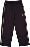 👖 youth jordan track pants: nike's top choice for active boys' clothing logo