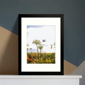 img 1 attached to 🖼️ 12x16 Picture Frame with Matting for 8.5x11 Picture or Without Mat, Black