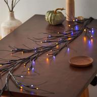 🍂✨ mengnan 6ft fall halloween vine fairy lights: 48 orange and purple bi-color lights, glittered garland string lights for indoor halloween party decor. battery operated autumn lights! логотип