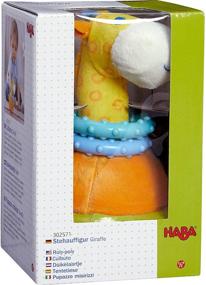 img 1 attached to 🦒 HABA Soft Wobbling & Chiming Roly Poly Giraffe Baby Toy with Teething Rings