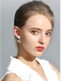 img 2 attached to 🌸 CHUNYANAN Boho Charm Sparkly White Shell Flower With Gold Metal Leaf Earrings: Simple, Stylish, & Hypoallergenic Jewelry Gift for Women & Girls