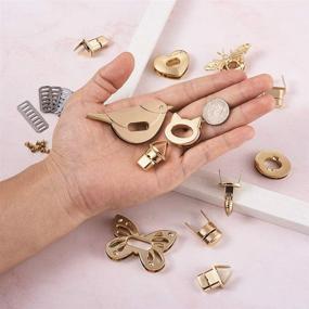 img 1 attached to 👜 Craftdady 6 Sets Handbag Hardware Accessory: Purse Turn Lock Clutch Closures - Bees, Butterflies, Birds, Cats, Ovals, Hearts - Bag Twist Lock for Clutches and Handbags