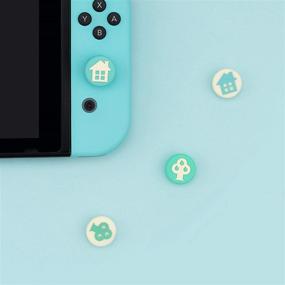 img 1 attached to 🎮 GeekShare 4PCS Silicone Tree and House Joycon Thumb Grips for Nintendo Switch /OLED/ Switch Lite - Comfortable Analog Thumb Stick Grips and Joystick Caps