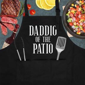 img 3 attached to Daddio of The Patio - Funny BBQ Grill Apron for Dad - Perfect Gifts for Dad, Husband, Father in Law, Step Dad - Unique Christmas, Birthday Gifts - Dad Apron for Grilling BBQ