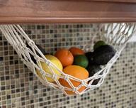 🥦 revolutionize your kitchen with homecredibles macramé cotton rope fruit hammock: efficient under cabinet hanging solution for organizing fruits and vegetables логотип