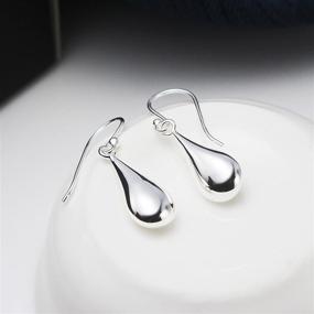 img 1 attached to 💧 Sleek Silverline - Polished Sterling Silver Teardrop Dangle Earrings