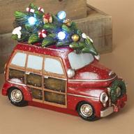 vintage red christmas car tabletop decoration with lit christmas tree logo