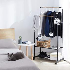 img 3 attached to 👗 YOUDENOVA Clothes Rack with Shelves: Rolling Clothing Rack for Hanging and Drying Clothes in Black