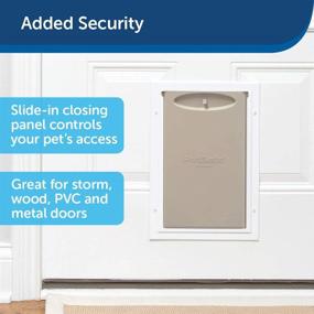 img 1 attached to 🐾 PetSafe Freedom Aluminum Pet Door - Interior & Exterior Dog and Cat Door - Sturdy Frame & Tinted, Flexible Flap - Easy Installation - Large/X-Large Sizes