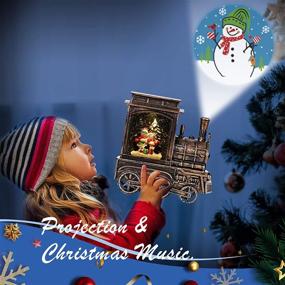 img 1 attached to 🎄 Immerse in the Joy of Christmas with Snow Globes and Music: 8 Festive Songs, Swirling Projector Lights, Decorative Lanterns - Battery & USB Powered