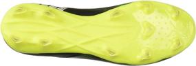 img 1 attached to PUMA Ultra Soccer Shoes: Stylish Black, White, and Yellow Design