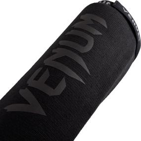 img 1 attached to Protective Power: Venum 'Kontact' Shin and Instep Guards for Maximum Defense