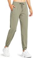 libin women's lightweight joggers pants: stay dry & stylish with quick-dry running and hiking pants featuring zipper pockets! logo