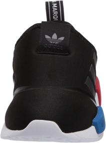 img 3 attached to Унисекс кроссовки для детей NMD 360 от adidas Originals.