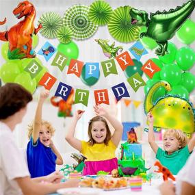 img 2 attached to Dinosaur Birthday Decorations: 92-Piece Party Set with Balloons, Banner, Backdrop, Paper Fan, Curtains, and Pump - Ideal for Kids' Birthday Party