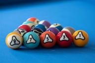 dynasphere platinum 2-1/4 in. belgian billiards pool balls set: superior quality with racks logo