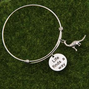 img 3 attached to Stylish BNQL Jurassic Park Charm Bracelet: Celebrate Resilience with the Life Finds a Way Bracelet