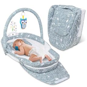 img 4 attached to 👶 Маленький Jumbl Snuggle Nest: Портативная складная детская кроватка с ночным светом, музыкальным проигрывателем, подвесной игрушкой и ручкой для переноски - максимальный комфорт и удобство для вашего малыша!