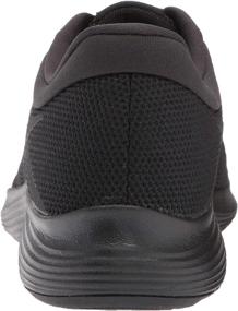 img 2 attached to Nike Men's Revolution 4 Running Shoe: 👟 Sleek and Comfortable in Black, Size 7 US