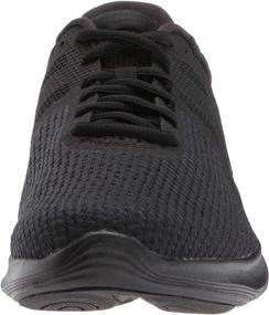 img 3 attached to Nike Men's Revolution 4 Running Shoe: 👟 Sleek and Comfortable in Black, Size 7 US