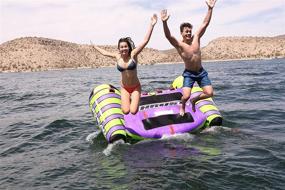 img 2 attached to Experience Exhilarating Fun with AIRHEAD Thrust, 3 Rider Towable Tube in Vibrant Green/Purple!