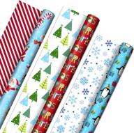 🎄 hallmark adorable reversible christmas wrapping paper for children (3 rolls: 120 sq. ft. total) penguins, santa claus, trees, stripes, snowflakes, 'merry christmas' logo