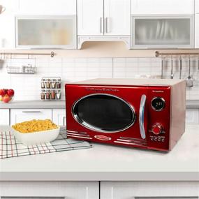 img 2 attached to 🔴 Nostalgia RMO4RR Retro Large 0.9 cu ft 800W Countertop Microwave Oven with 12 Pre-Programmed Cooking Settings, Digital Clock, Easy-Clean Interior in Metallic Red