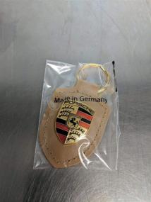 img 1 attached to Porsche Crest Key WAP0500980H in Elegant Beige