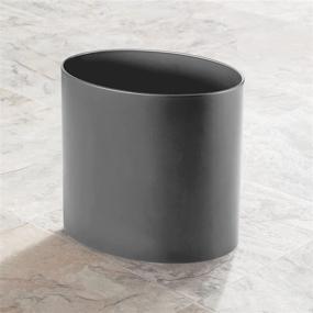 img 2 attached to 🗑️ mDesign Oval Metal Decorative Small Trash Can Wastebasket, Garbage Bin for Bathrooms, Kitchens, Home Offices, Dorm Rooms - Solid Stainless Steel - Graphite Gray