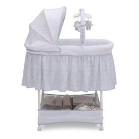 img 3 attached to 🐤 Кроватка Simmons Kids Gliding Bedside Bassinet - Портативная кроватка с подвижной трубой, вращающимися игрушками, вибрацией, ночником и музыкой - Павлин - Улучшенный SEO