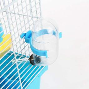 img 2 attached to 🐹 JUILE YUAN 2-Tier Portable Travel Cage with Carry Handle for Small Animals, Dwarf Hamster Travel Carrier incl. Exercise Wheel, Water Bottle, and Food Dish, Size 6.7 x 11.8 x 9.1 Inch
