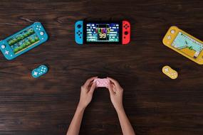 img 2 attached to 🎮 Yellow Edition 8Bitdo Zero 2 Mini Controller: Bluetooth Key Chain Sized for Nintendo Switch, Windows, Android, and macOS