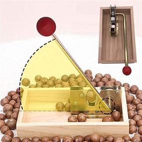 img 4 attached to 🌰 Adjustable Heavy Duty Manual Pecan and Macadamia Nutcracker Tongs - Nut Cracker Machine with Handle for Walnuts, Chestnuts, Pecans, Hazelnuts, Almonds - Efficient Shell Peeling Tool