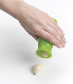 img 1 attached to OXO Good Grips Clear Silicone Garlic Peeler with Stay-Clean Storage Case - 1EA