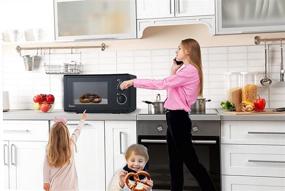 img 1 attached to 🔥 Impecca CM0674K Black Microwave Oven: 700W, 0.6 cu. ft. Countertop Appliance - Efficient and Stylish