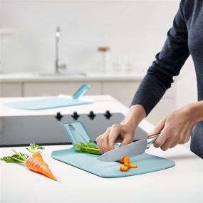 img 2 attached to 🔪 Joseph Joseph Chop2Pot Foldable Plastic Cutting Board, 15 x 8.75, Non-Slip Feet, 4-inch Handle, Dishwasher Safe, Small Size, Dove Gray