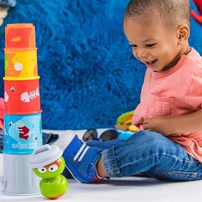 img 1 attached to Bright Starts Sesame Street Oscar the Grouch Stacking Cans: Fun Stackable Cups for Babies 3-12 Months