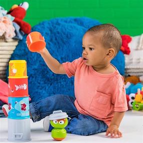 img 2 attached to Bright Starts Sesame Street Oscar the Grouch Stacking Cans: Fun Stackable Cups for Babies 3-12 Months