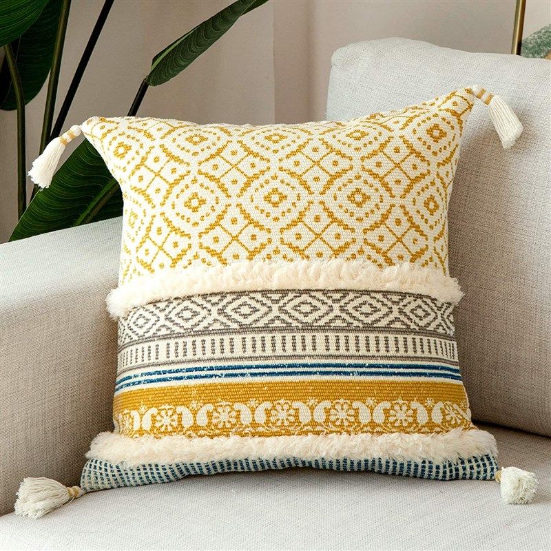 blue page tufted decorative pillow 로고