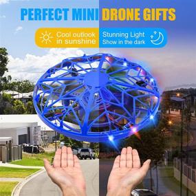 img 3 attached to 🚀 Fun and Exciting Hand Operated Mini Drone for Kids - Perfect Christmas and Birthday Gifts for Boys/Girls Age 6-10! LED UFO Design with 360° Rotation, Infrared Sensor and USB Rechargeable Features, One Key Take Off/Landing Included