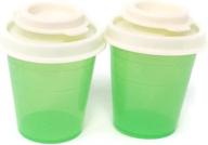 green personal salt and pepper shakers by tupperware logo