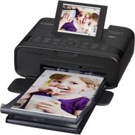 🖨️ canon selphy cp1300 compact photo printer, black - high-quality prints in a sleek design logo