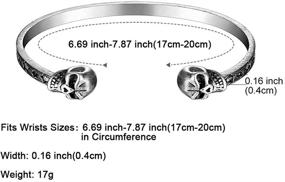 img 2 attached to 🔥 Мода FGA. Стильный браслет с черепом/волчьей головой из нержавеющей стали с регулируемым открытым манжетом, гравированными звездами и чернением - унисекс-браслет для женщин и мужчин.