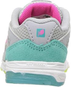 img 2 attached to 👟 Stylish and Supportive: New Balance Running Silver Rainbow Girls' Shoes