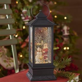 img 2 attached to 🎅 11 Inch Black Lighted Snow Globe Lantern: RAZ Imports Holiday Water Lantern with Santa and Snowman