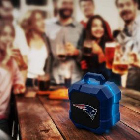 img 2 attached to Незабываемый звуковой опыт: Беспроводный Bluetooth-динамик LED Shockbox NFL New England Patriots в корпусном цвете команды.