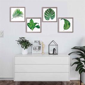 img 3 attached to TERESA'S COLLECTIONS 4 Pack 10x10 Picture Frame Set with Tropical Botanical Green Plant Print for Wall Decor, Square Photo Frame Collage Wall Art Framed - Ideal for Home Decorations