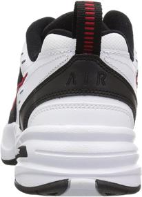 img 2 attached to NIKE Monarch Trainer Metallic Midnight Sports & Fitness