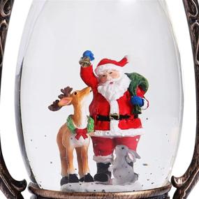 img 1 attached to 🎶 Musical Christmas Snow Globe Lantern: Glitter Santa Deer Holiday Decor Gift with Timer and USB Music