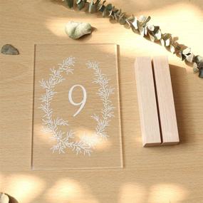 img 3 attached to 🌿 UNIQOOO Wedding Table Numbers 1-20 - Acrylic with Wood Stands, 4x6 inch, Botanical Olive Wreath Design, Clear Table Number Signs and Holders, Ideal for Reception, Centerpiece Decoration, Event, Party